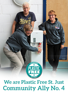 Plastic Free St. Just awarded GO St. Just 'Plastic Free Champion' status. Pic shows 3 m3mbers of staff using the new water dispenser that replaces platic bottles of water.